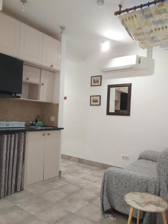 Kuchyň nebo kuchyňský kout v ubytování Malaga Ensuites City Centre