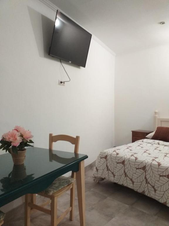Postel nebo postele na pokoji v ubytování Malaga Ensuites City Centre