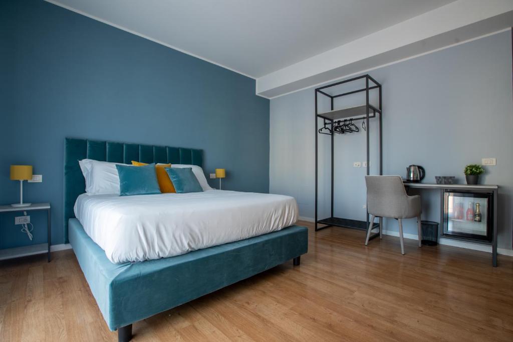 Postel nebo postele na pokoji v ubytování Alma Sorrento Suite