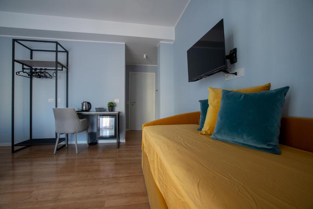 Postel nebo postele na pokoji v ubytování Alma Sorrento Suite