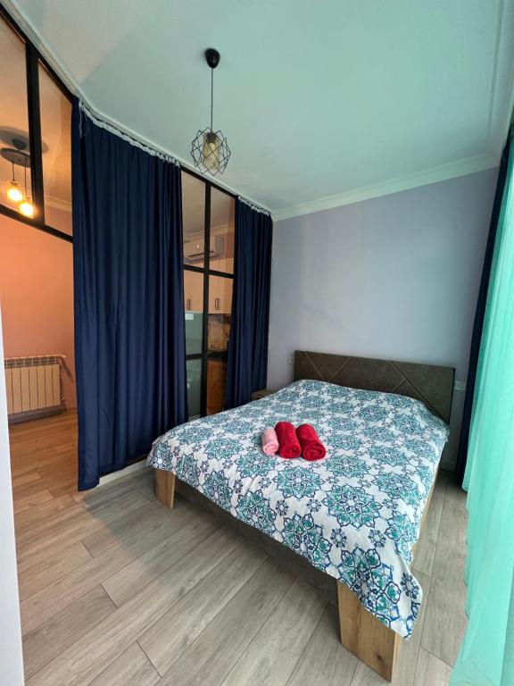 Postel nebo postele na pokoji v ubytování Apartment Merabi