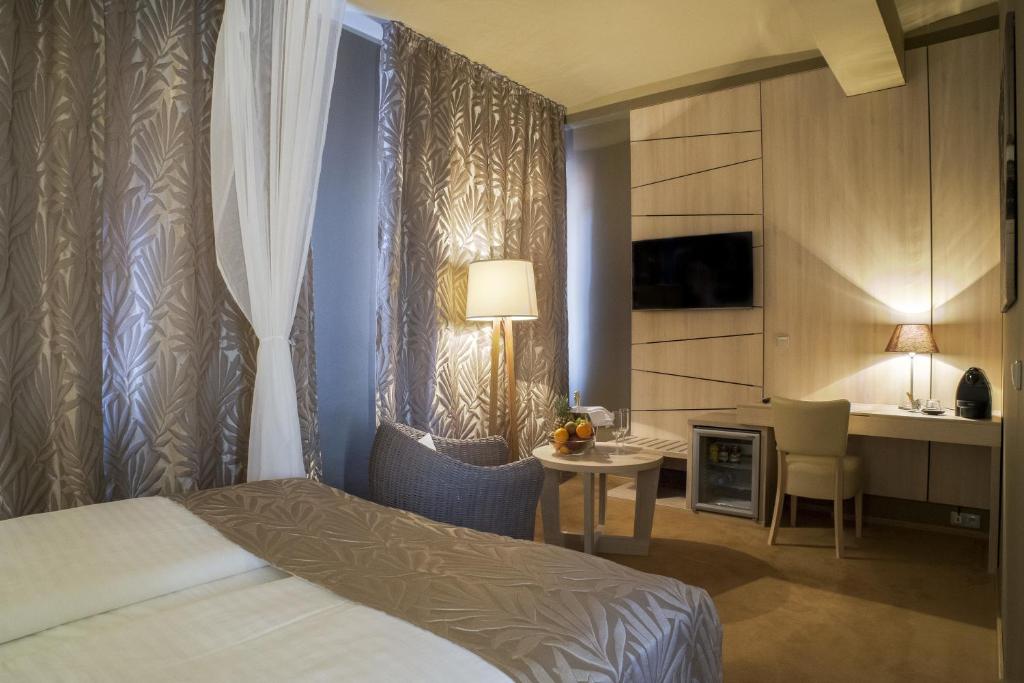 Postel nebo postele na pokoji v ubytování Pytloun Kampa Garden Hotel Prague