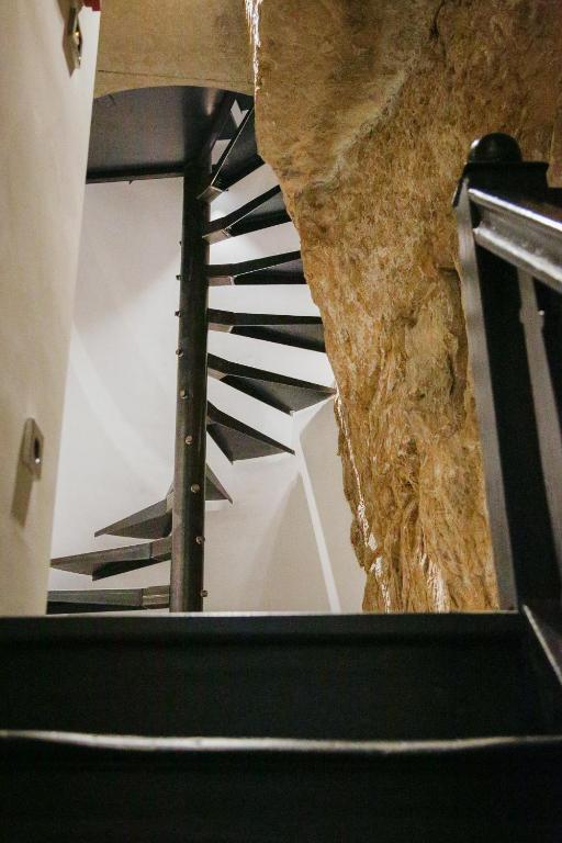 a view of a spiral staircase in a building at La Pipistrelle Hotel in Luxembourg