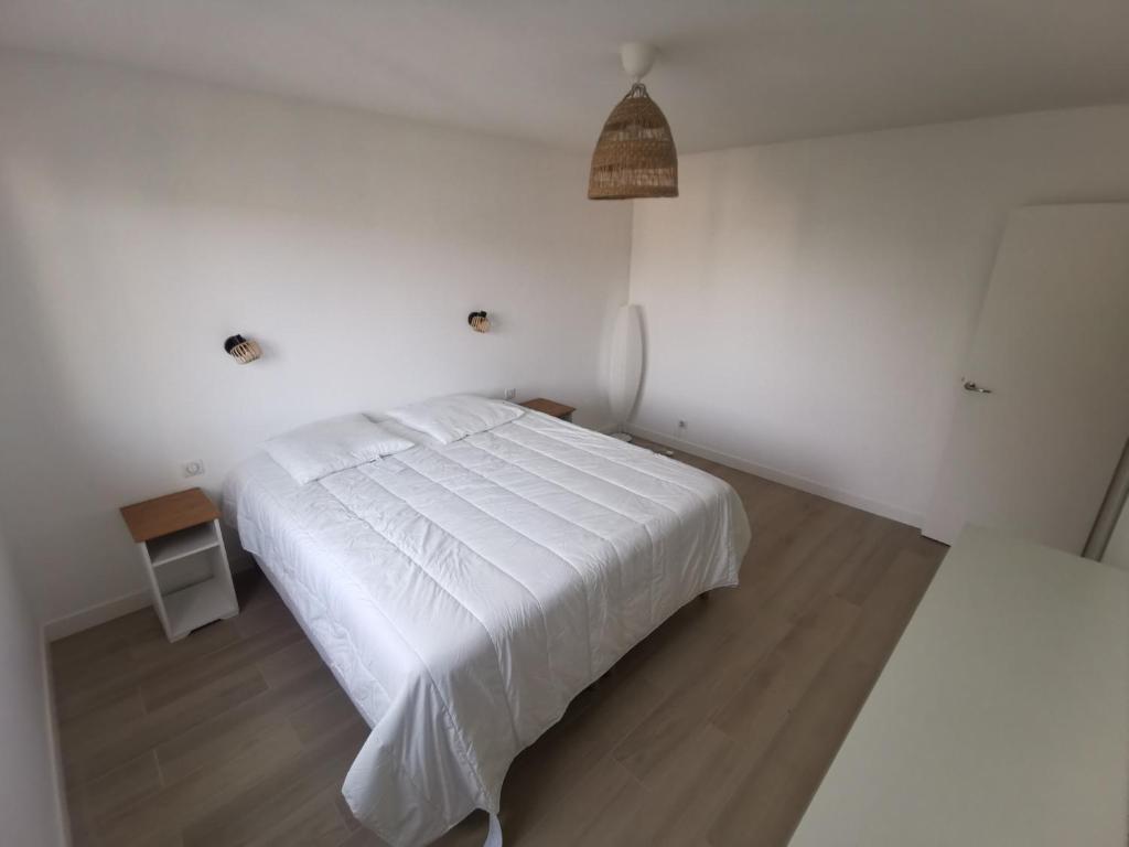 Krevet ili kreveti u jedinici u okviru objekta Ker Romain - Sea View - 3 bedrooms Appt