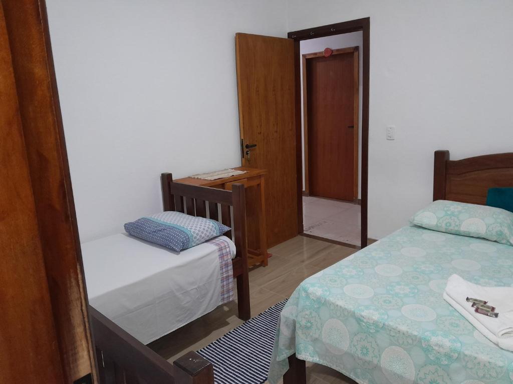 Postel nebo postele na pokoji v ubytování Pousada Pé na Areia