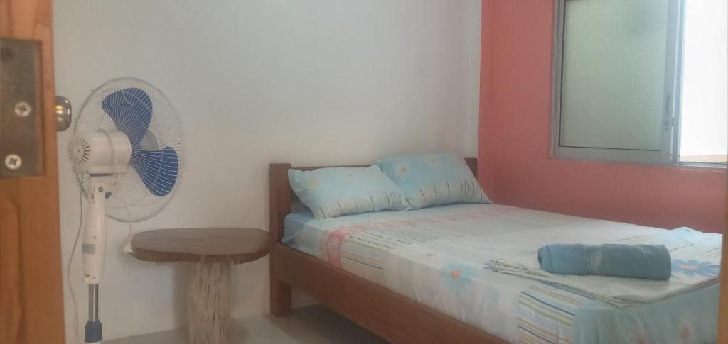 Postel nebo postele na pokoji v ubytování OCEANSURF hosteria