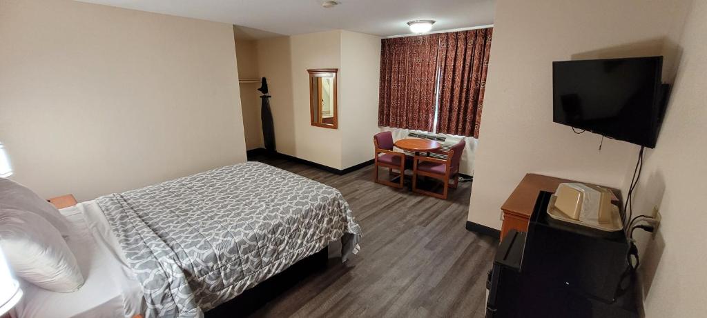 TV a/nebo společenská místnost v ubytování Harvey's Motel SDSU La Mesa San Diego