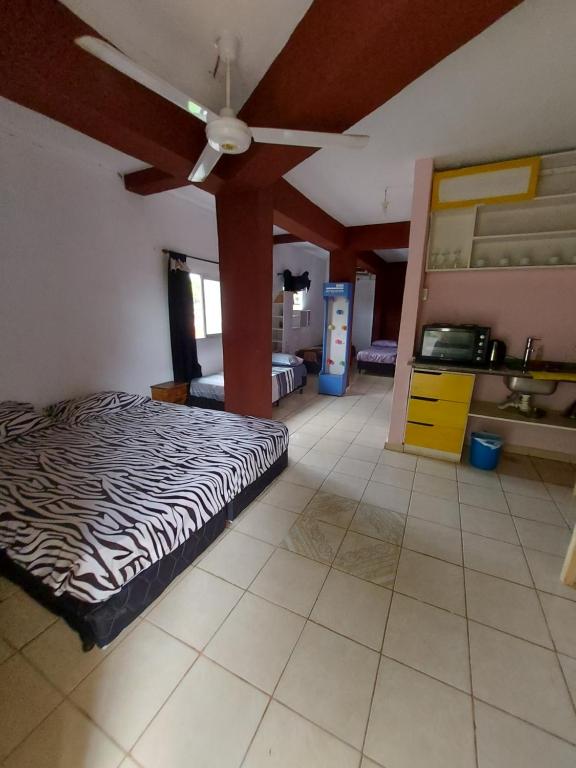 Postel nebo postele na pokoji v ubytování Hotel Los Chow Chow