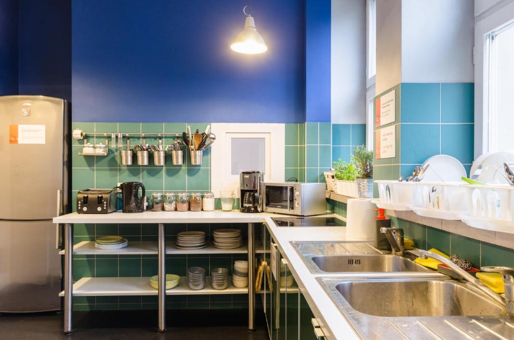 Kuchyňa alebo kuchynka v ubytovaní Tatamka Hostel