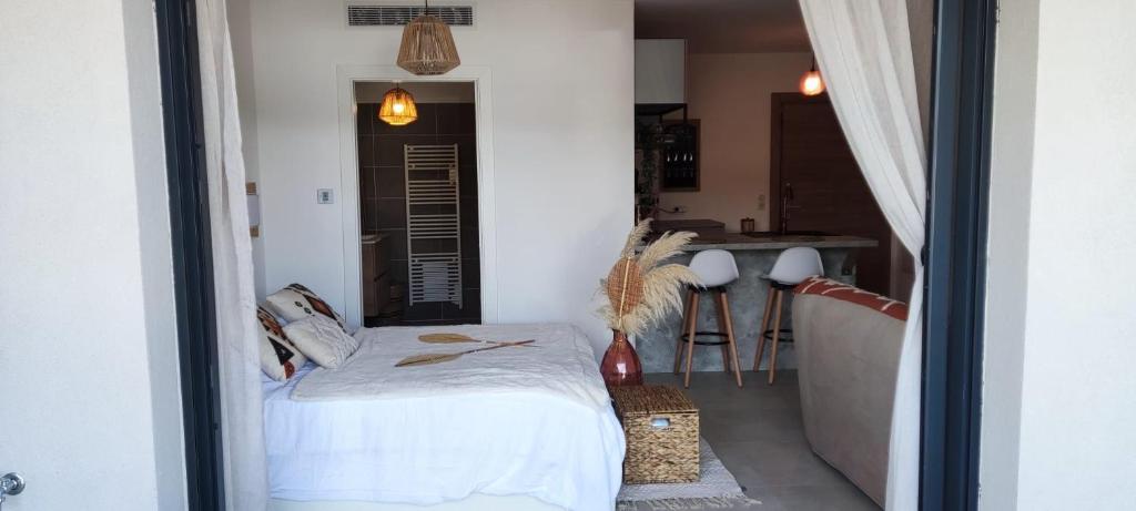 Posteľ alebo postele v izbe v ubytovaní Appartement Agosta Plage