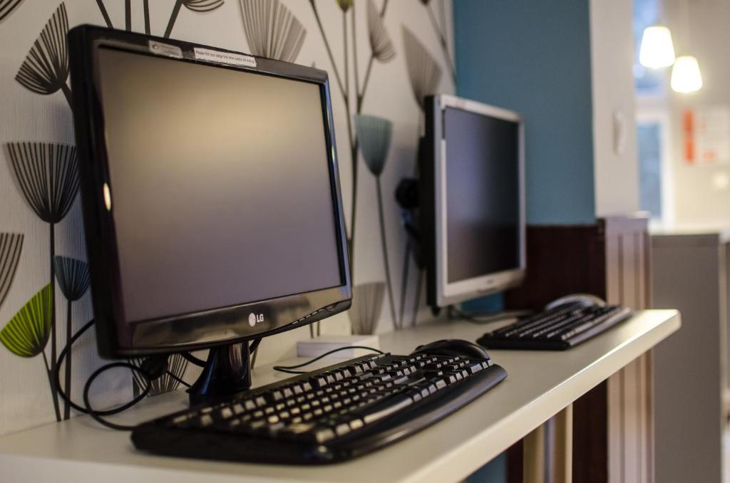 Televízia a/alebo spoločenská miestnosť v ubytovaní Tatamka Hostel