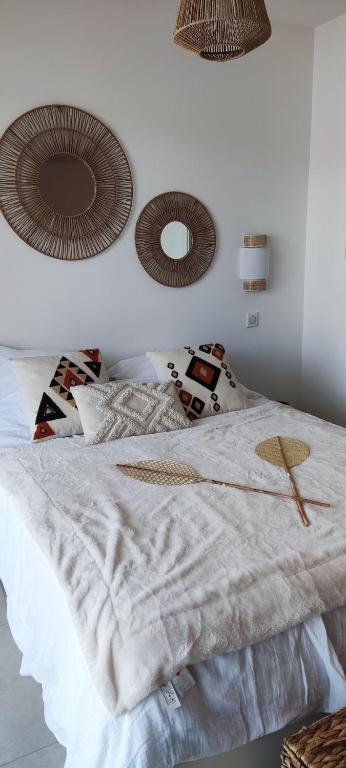 Posteľ alebo postele v izbe v ubytovaní Appartement Agosta Plage