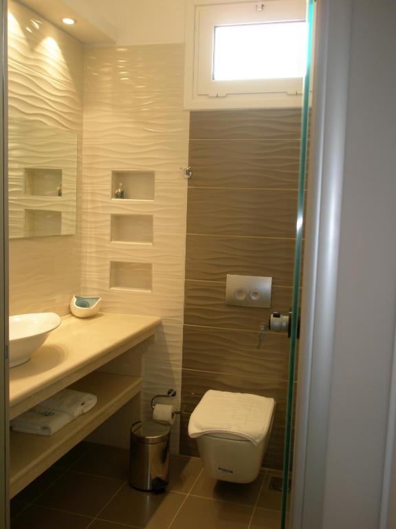 Ванная комната в WhiteSands Beach Resort