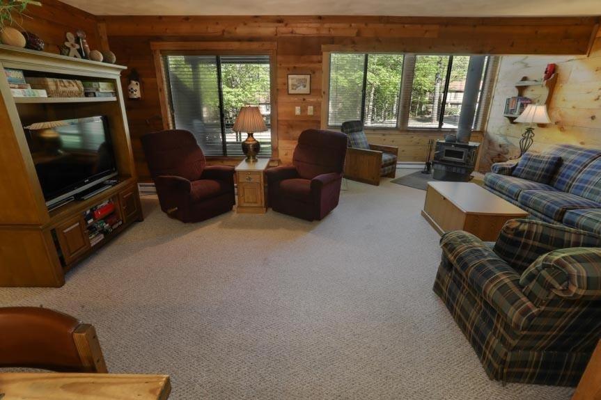 a living room with couches and a tv and a couch at Seven Springs Swiss Mountain 3 Bedroom Standard Condo, Close to Golf Course condo in Champion