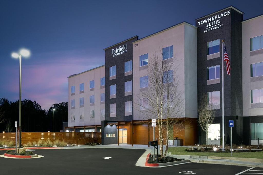 a rendering of the front of a hotel at TownePlace Suites by Marriott Canton Riverstone Parkway in Canton