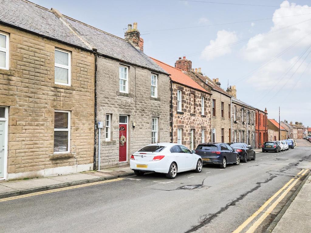 a street with cars parked on the side of a building at Number Twenty-nine in Berwick-Upon-Tweed