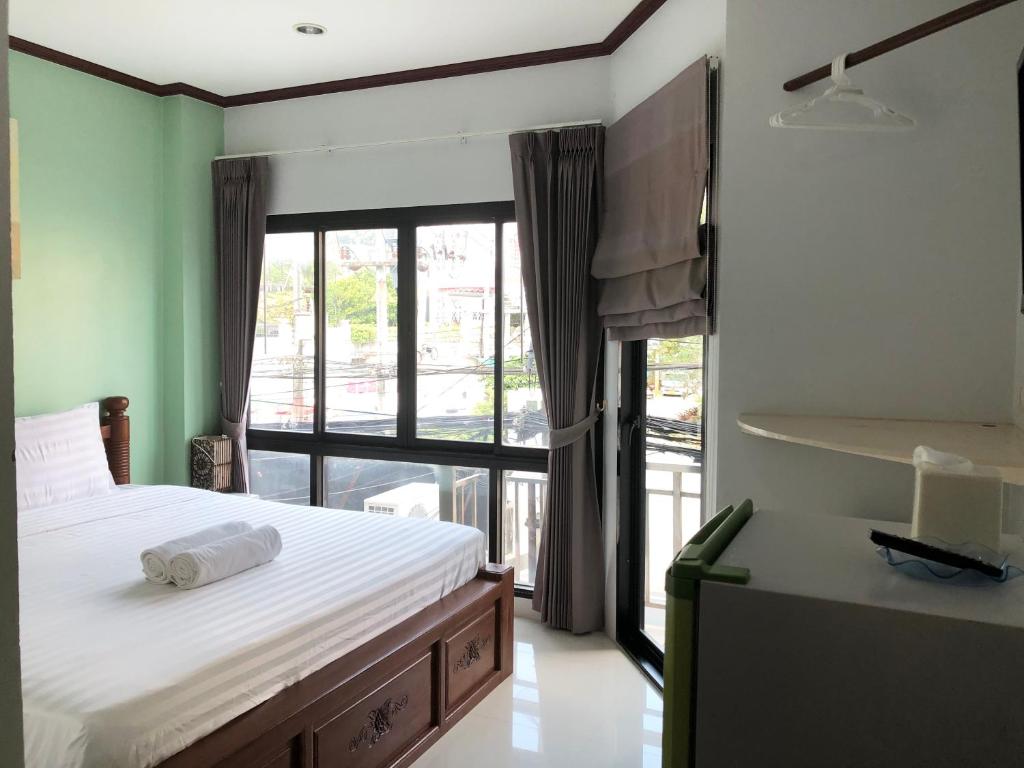 Postel nebo postele na pokoji v ubytování Hotel premier