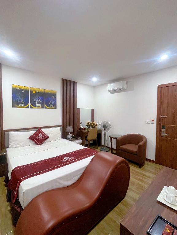 Postel nebo postele na pokoji v ubytování Rosy Motel Trung Yên