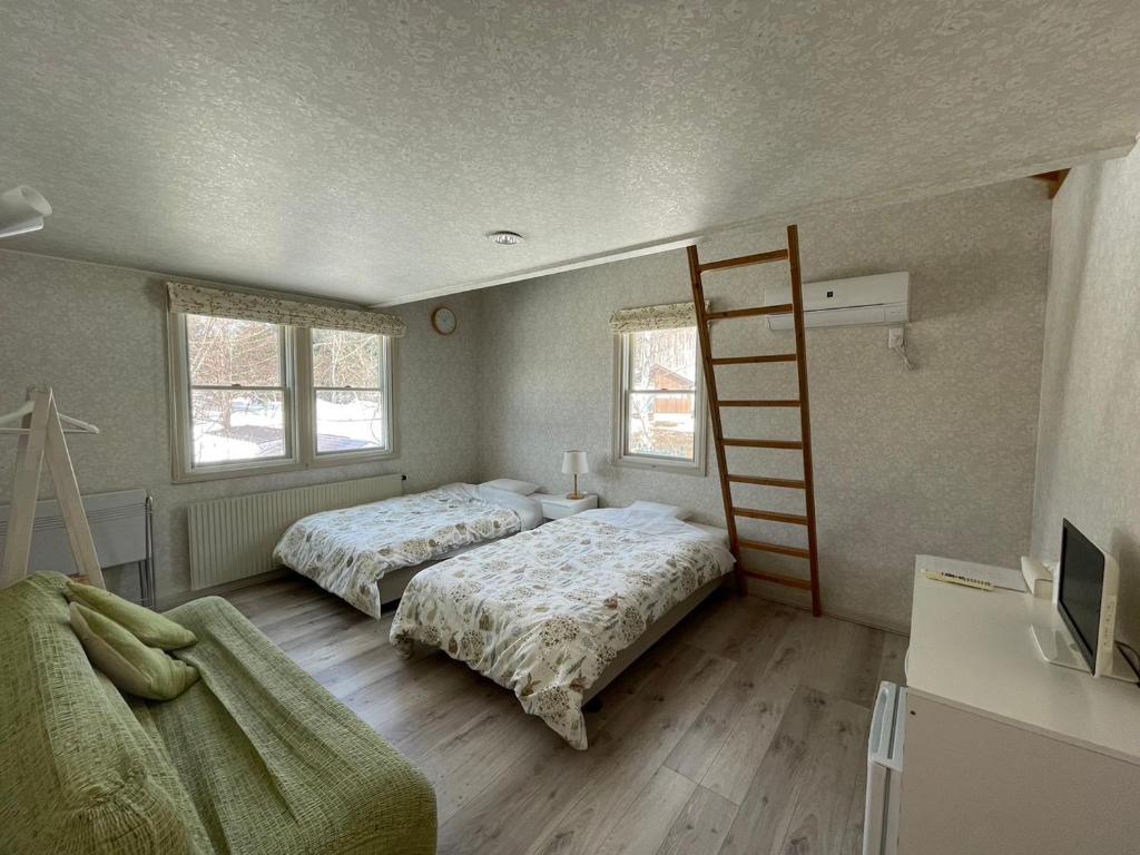 Rusutsu Pension Clydesdale - Camera Con Soppalco E Bagno In Comune