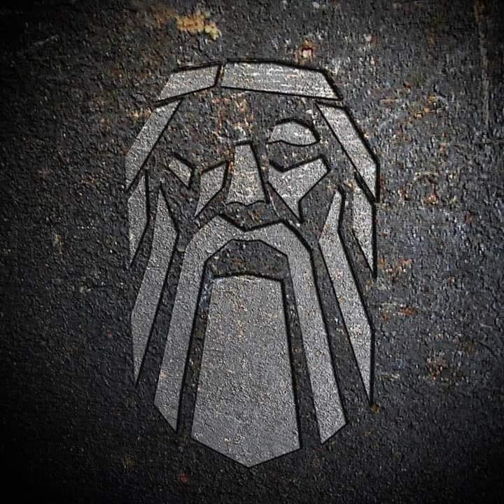 aphaltphaltphaltphalt with a stenciled picture of a transformers head at ASGARD RESORT GUATEMALA in Santiago Sacatepéquez