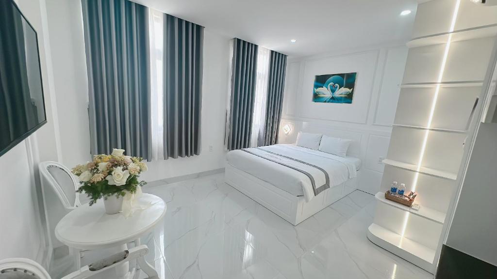 Postel nebo postele na pokoji v ubytování PARIS HOTEL