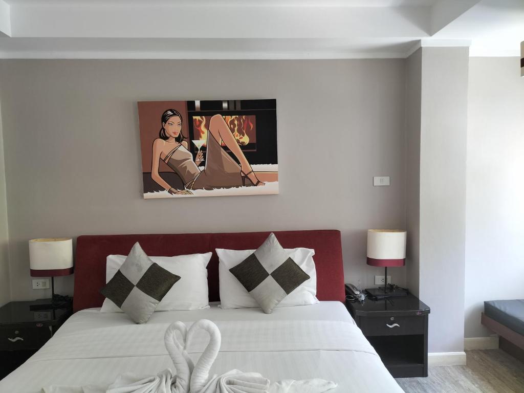 Postel nebo postele na pokoji v ubytování Kata Beach Studio Phuket