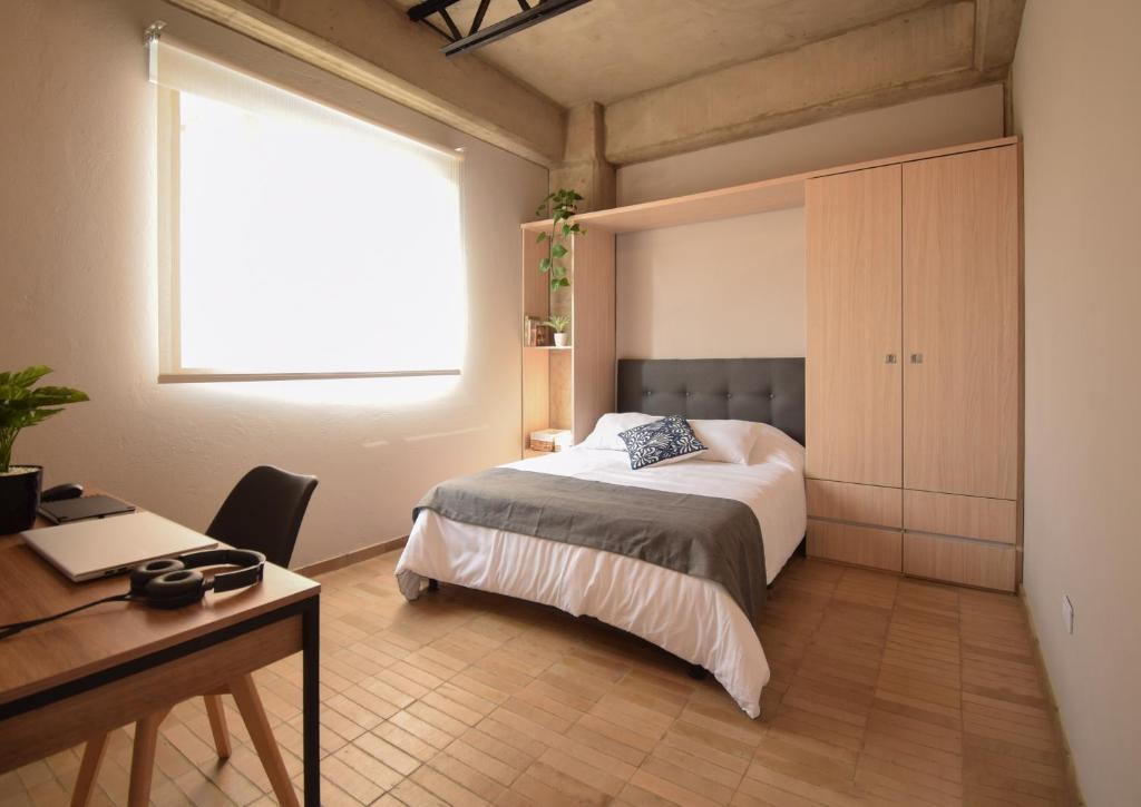 Ένα ή περισσότερα κρεβάτια σε δωμάτιο στο Cadena Hotelera Rey es
