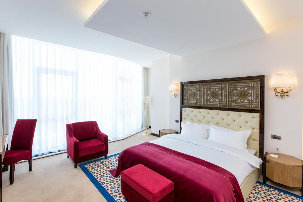 Postel nebo postele na pokoji v ubytování KADORR Hotel Resort & Spa