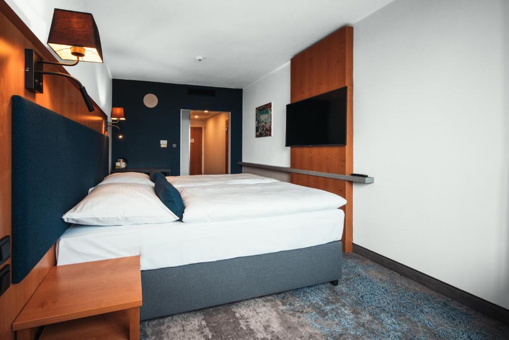 OREA Hotel Pyramida Praha客房内的一张或多张床位