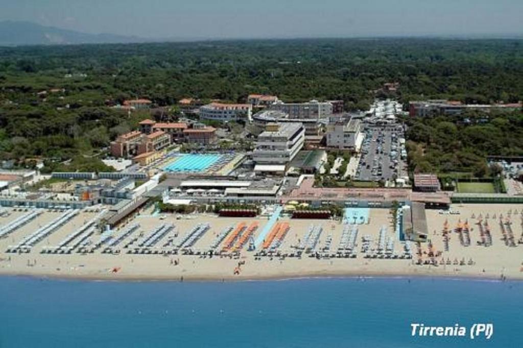 an aerial view of a resort with a beach at Tuscany By The Sea in Tirrenia