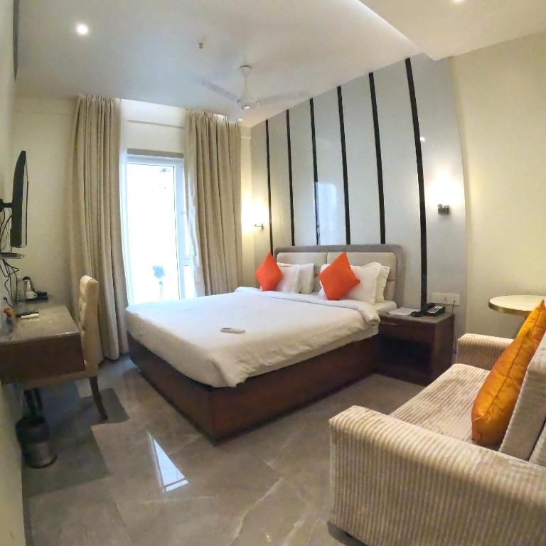 Postel nebo postele na pokoji v ubytování Brio Hotel