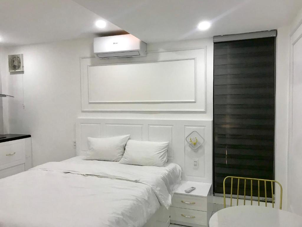 Postel nebo postele na pokoji v ubytování PARIS HOTEL