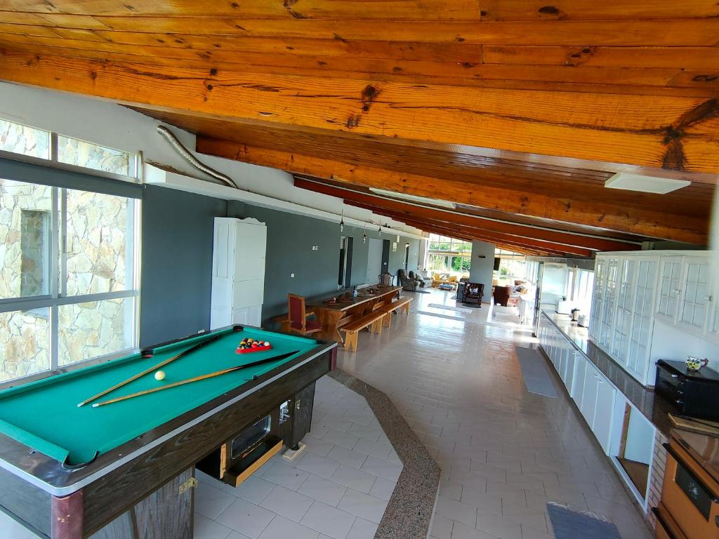 a billiard room with a pool table in a house at Casa Mosteiro in Bribes