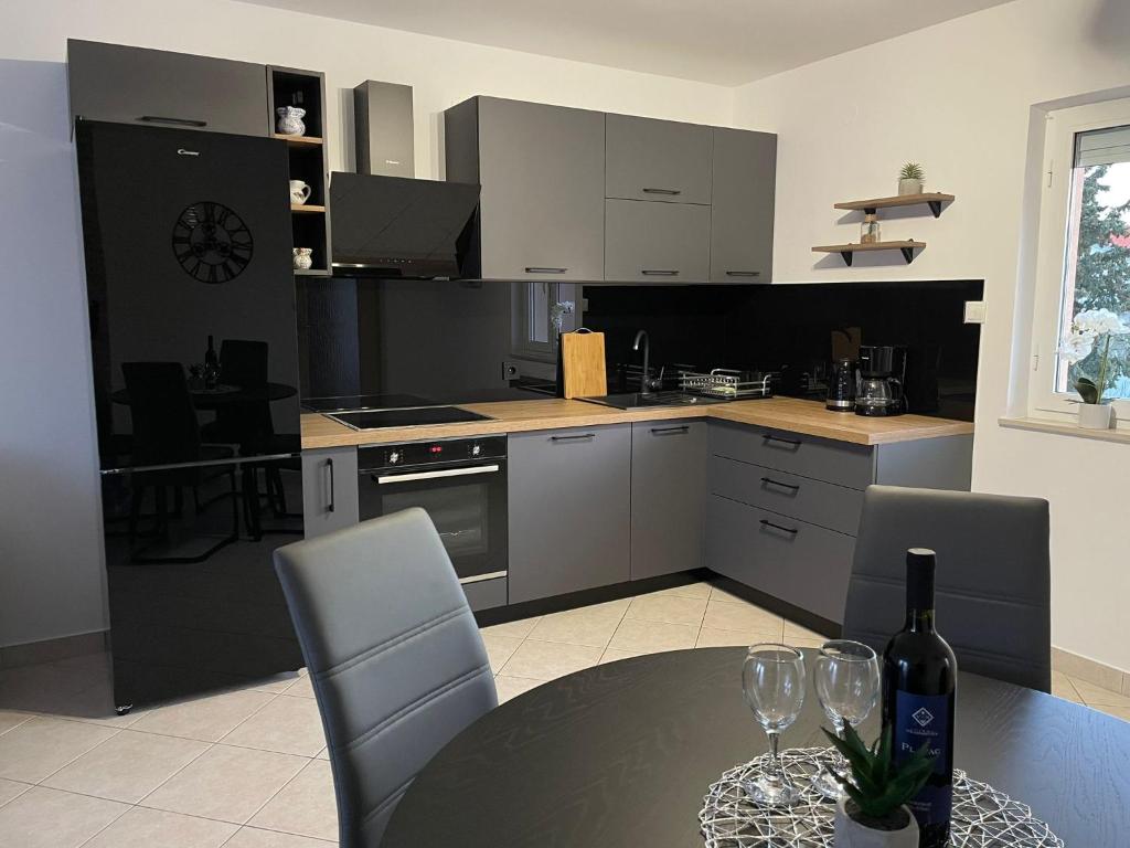 Kuchyň nebo kuchyňský kout v ubytování Apartments Elvira
