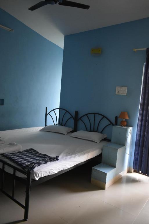 Postel nebo postele na pokoji v ubytování Casa Domingos Guest House
