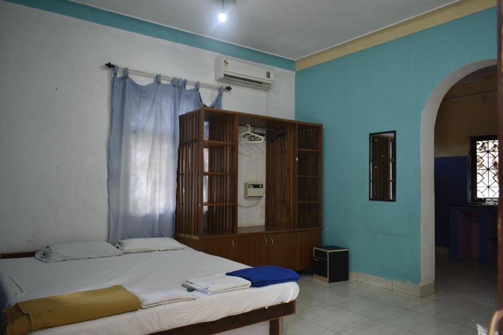 Postel nebo postele na pokoji v ubytování Casa Domingos Guest House