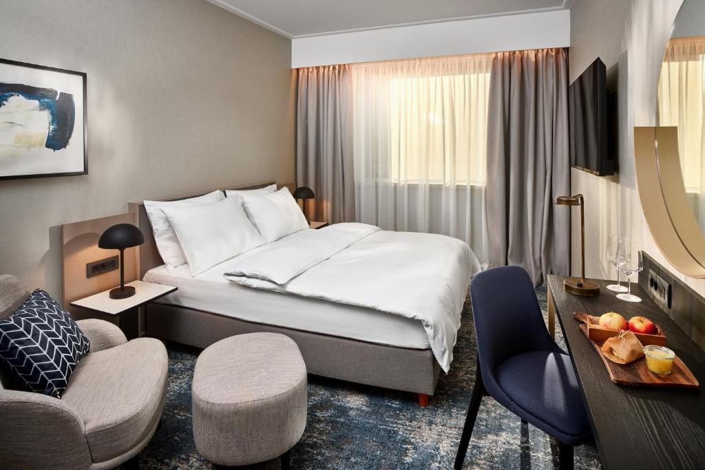 Postel nebo postele na pokoji v ubytování Hotel International by Maistra City Vibes