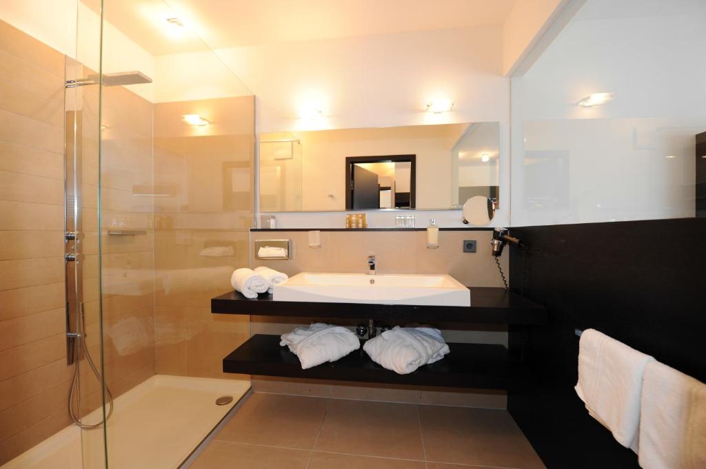 Koupelna v ubytování Hotel Vier Jahreszeiten