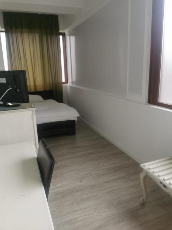 Postel nebo postele na pokoji v ubytování Nevis Fundeni