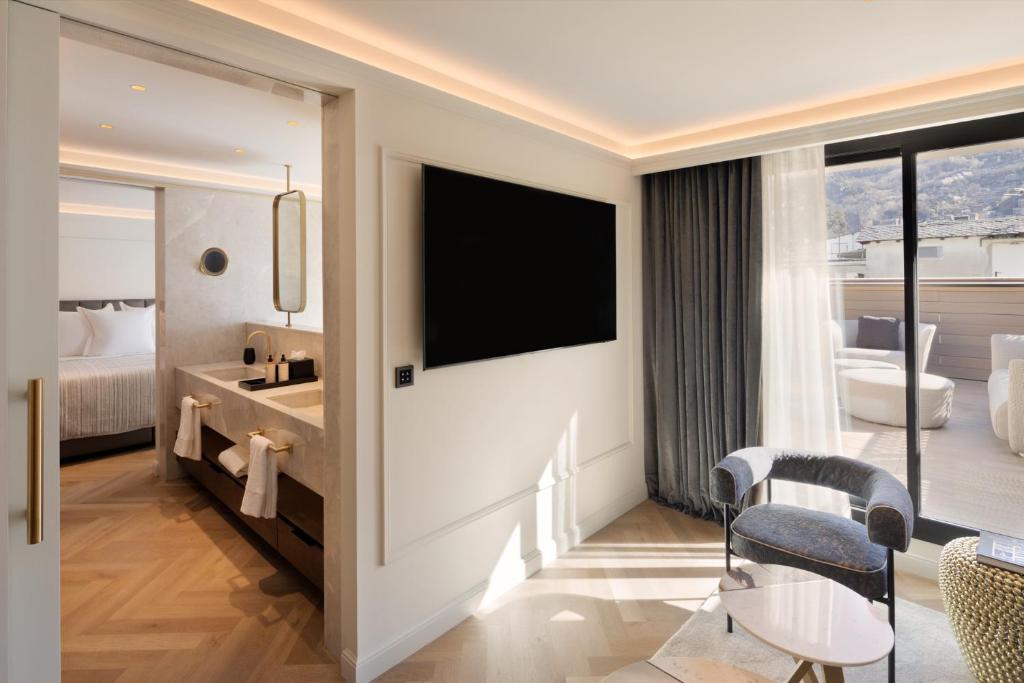 TV a/nebo společenská místnost v ubytování Hotel MIM Andorra