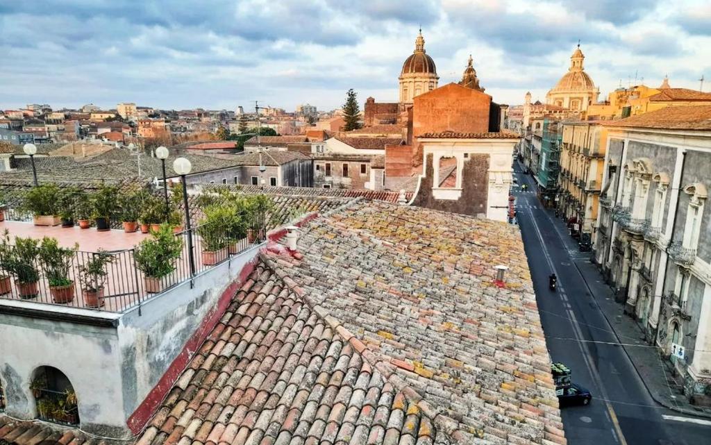 a view of a city from the roof of a building at Hotel Biscari in Catania