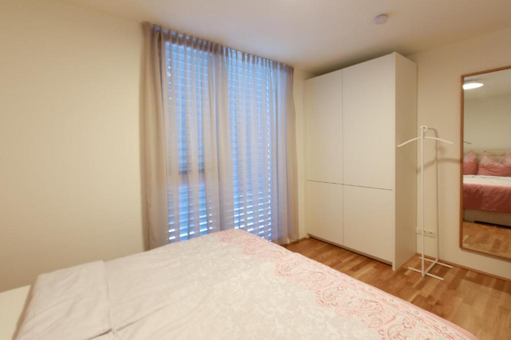 Postel nebo postele na pokoji v ubytování Wohlfühlapartments in Hard
