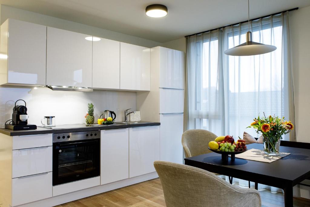 Kuchyň nebo kuchyňský kout v ubytování Wohlfühlapartments in Hard