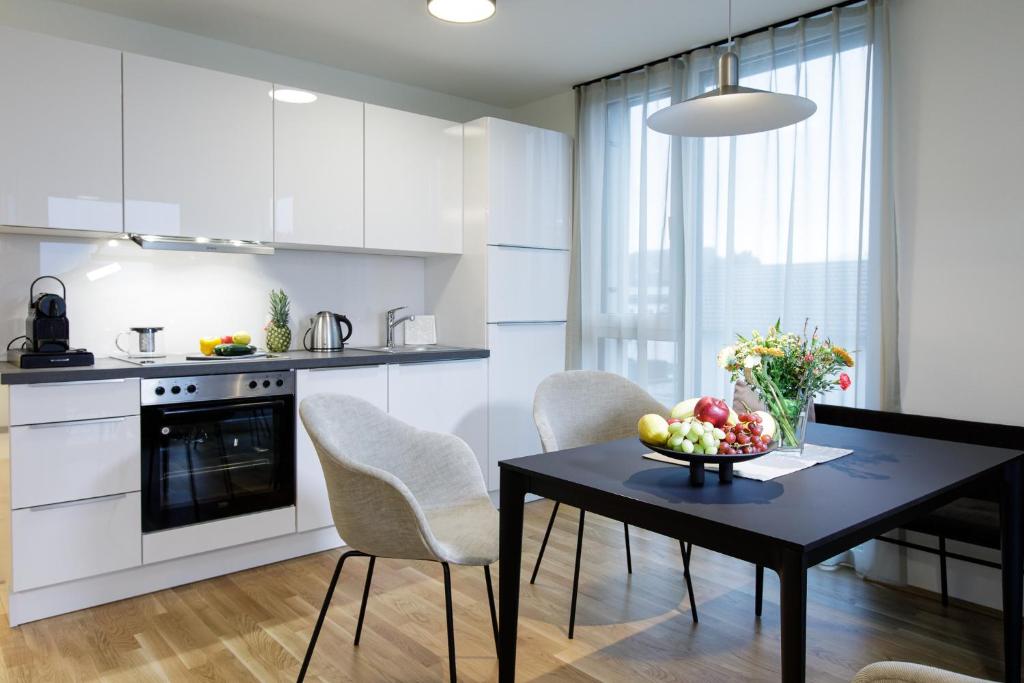 Kuchyň nebo kuchyňský kout v ubytování Wohlfühlapartments in Hard