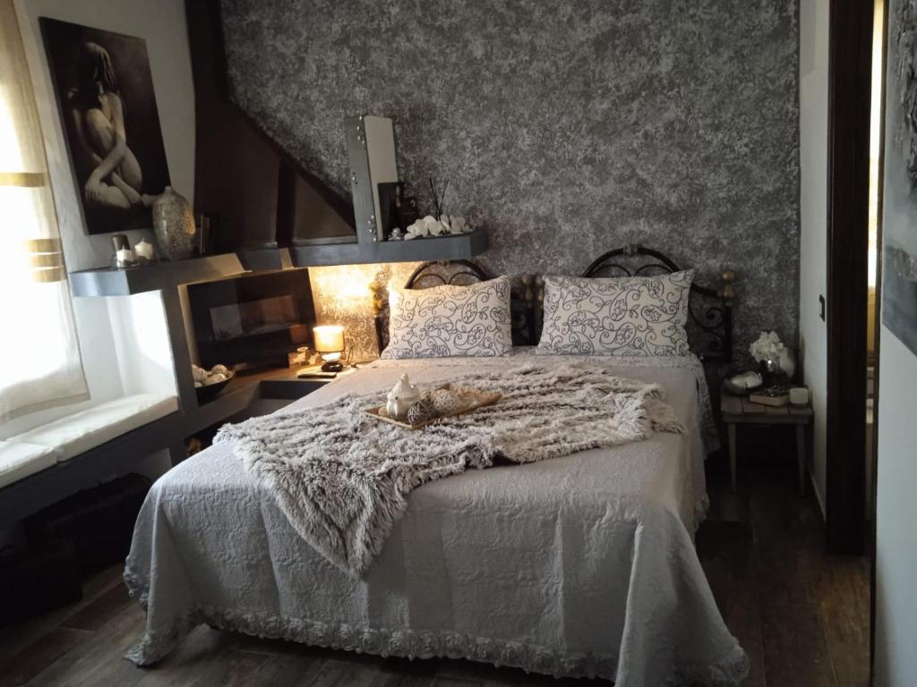 Postel nebo postele na pokoji v ubytování Rooms Romangia