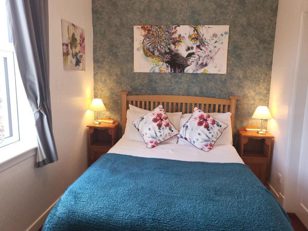 Postel nebo postele na pokoji v ubytování Maridon House