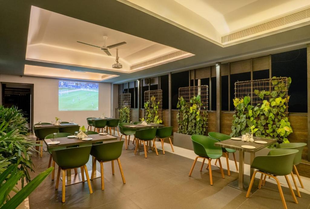 TV a/nebo společenská místnost v ubytování Sugar Business Hotel