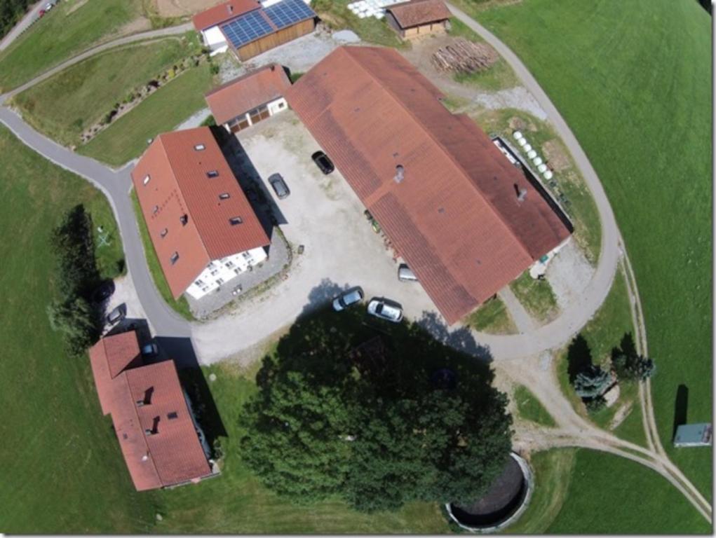 an overhead view of a building with a roof at Ferienhof Landhaus Michael in Böbrach