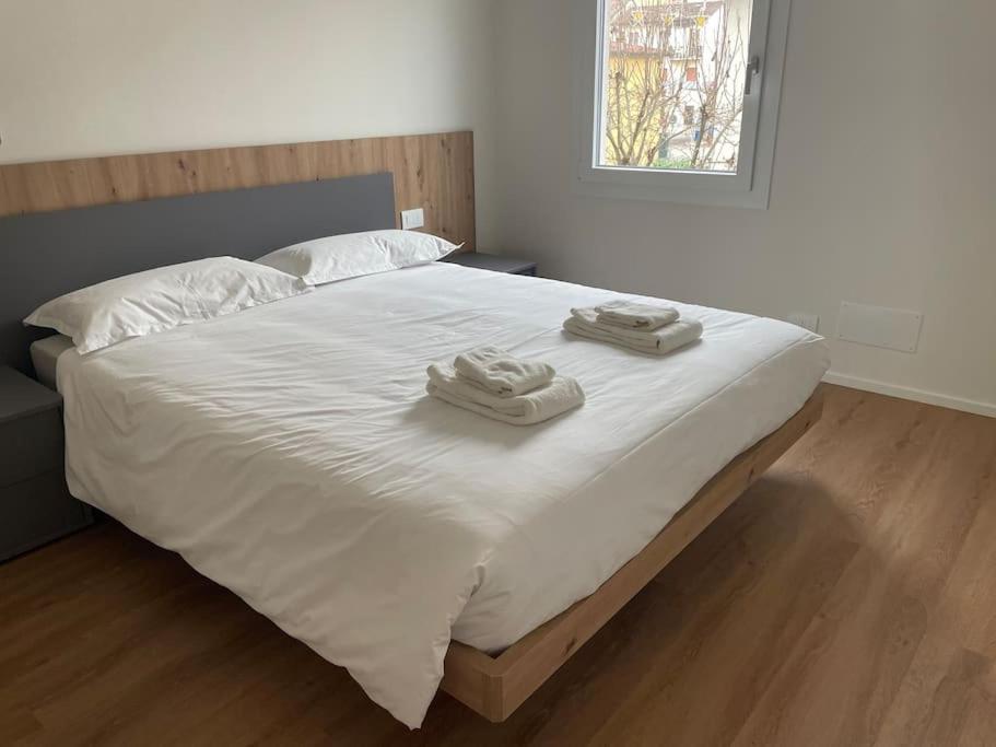 Krevet ili kreveti u jedinici u objektu G83Home-Appartamento moderno in zona Fiera