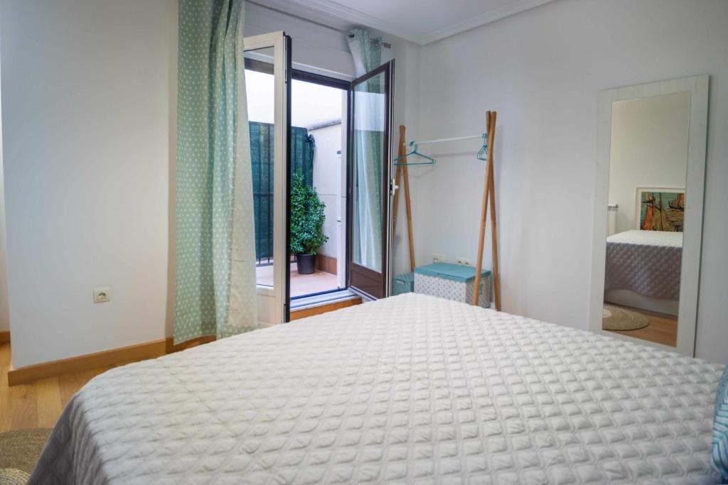 Posteľ alebo postele v izbe v ubytovaní Sampiruco Apartamento